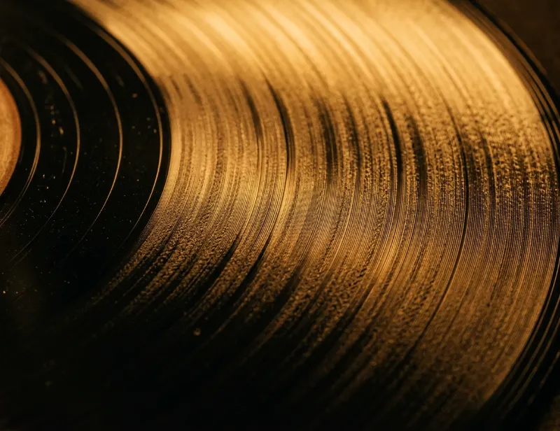 Macro vinyl groove ridges illustrating acoustic cavitation cleaning